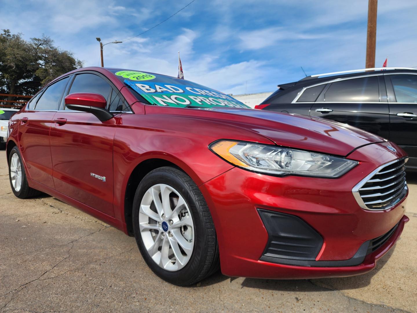 2019 RED Ford Fusion Hybrid SE (3FA6P0LU7KR) , AUTO transmission, located at 2660 S.Garland Avenue, Garland, TX, 75041, (469) 298-3118, 32.885551, -96.655602 - Welcome to DallasAutos4Less, one of the Premier BUY HERE PAY HERE Dealers in the North Dallas Area. We specialize in financing to people with NO CREDIT or BAD CREDIT. We need proof of income, proof of residence, and a ID. Come buy your new car from us today!! This is a 2019 FORD FUSION SE HYBRID - Photo#1